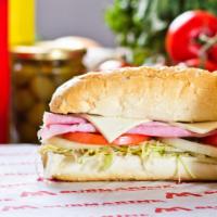 Ham Submarine · Freshly sliced ham, on top of mouth-watering veggies doused in our signature sauce and toppe...