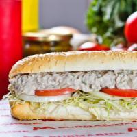 Tuna Submarine · A wonderful mix of tuna, mayonnaise, celery, spices and on top of mouth-watering veggies. 