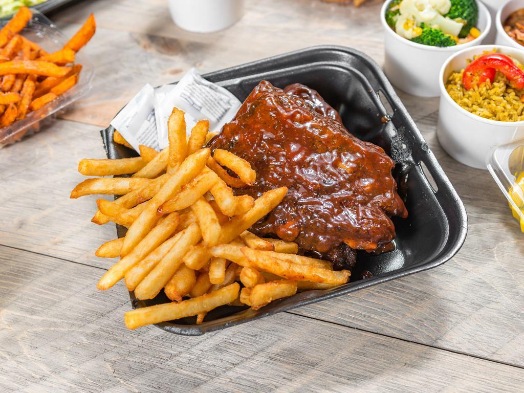 BBQ Ribs · Costillas. Slow-cooked baby back ribs, homemade dry rub, our signature rocoto BBQ sauce. Served with french fries. Gluten-free.