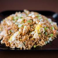 House Fried Rice · Cooked with egg, peas, carrots, onion and green onion.
