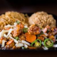 General Chicken · Crispy chicken with our house sweet brown sauce, carrots, onion, and jalapeno.