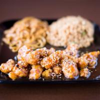 Sesame Chicken · Crispy chicken with our house sweet brown sauce topped with sesame seeds.