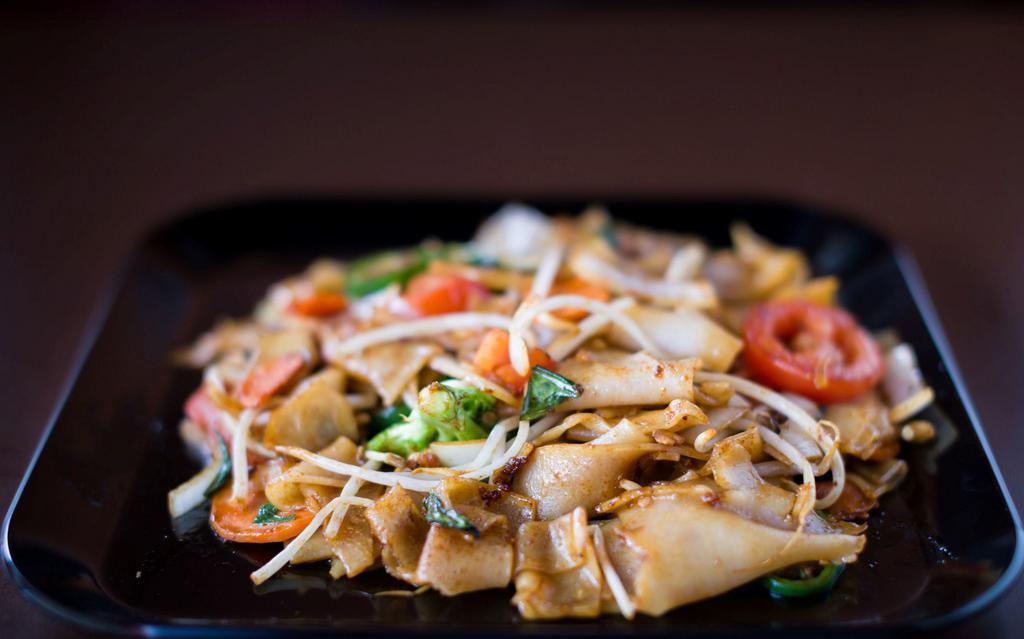 Drunken Noodles · Fresh noodles with onion, carrots, jalapeno, broccoli, bean sprouts, tomato and basil.