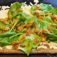 Organic Fresh Baby Spinach Crepe · Organic fresh baby spinach, caramelized onions, and Swiss cheese.