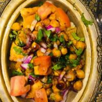 Samosa Chana Chat · A popular and delicious road side delicacy with deconstructed vegetarian samosas, garbanzo, ...
