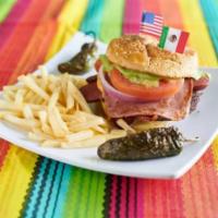 Hamburguesa Estilo Juarez · Hamburger patty on a seeded buttered bun with mayo, mustard, ketchup, american cheese, ham, ...