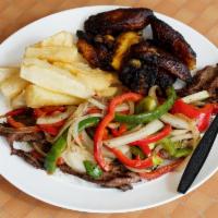 Carne Asada · Grilled steak with onions and peppers served with 2 side orders.