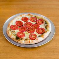 Pesto Pizza · Comes with fresh tomatoes and mozzarella.