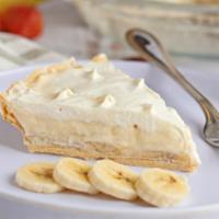 Slice of Banana Cream Pie · Layers of sliced bananas, house made vanilla cream filling topped with crunchy crumbles, and...