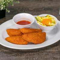 Pasteles · 4 pieces. Red-tinted corn flour-based empanadas stuffed with a choice of potato, chicken or ...
