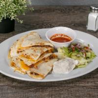 Quesadilla Mexicana · Tortilla with melted cheese inside. Choice of meat.