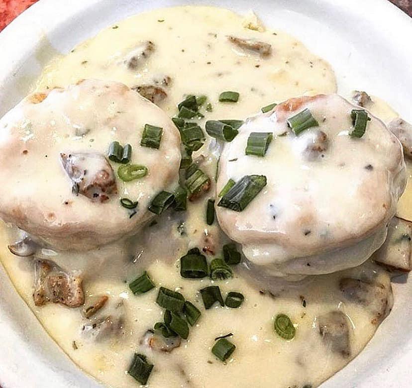 Wilbur and Gravy · Home fries, pork sausage, green pepper, yellow onion and cheddar and Jack smothered in our housemade pork sausage gravy and topped with 2 basted eggs.