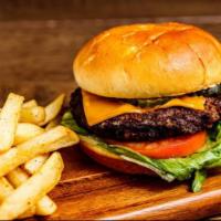 Main Land Burger · Grilled beef patty, American, tomato, lettuce, and pickle served on a toasted bun served wit...