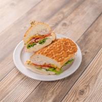 Roast Turkey Sandwich · Come with mayo, mustard, lettuce, tomato, pickles, onion and sprouts.