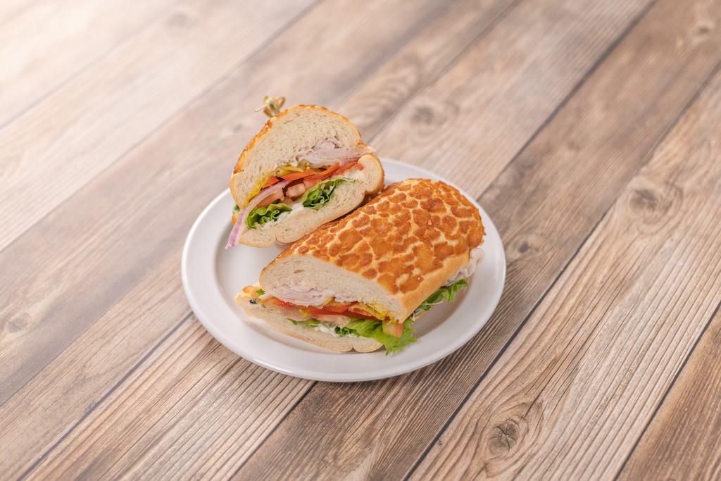 Roast Turkey Sandwich · Come with mayo, mustard, lettuce, tomato, pickles, onion and sprouts.