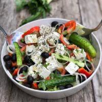 Greek Salad · Lettuce, tomatoes, green peppers, onions, cucumbers, black olives, pepperoncini, feta cheese...