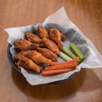 BUFFALO WINGS · Ten plump wings served with carrots, celery ＆ ranch