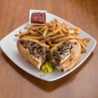 TRADITIONAL PHILLY · Shaved premium beef grilled with white american cheese.  Served on Amoroso roll