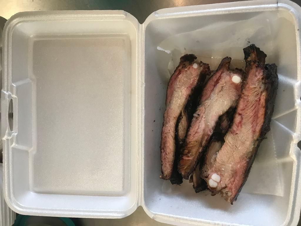 4 Bones · 4 Ribs & bread with SNB BBQ sauce on the side 