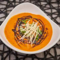 Charred Tomato Basil Bisque · Fire-roasted tomatoes, basil, Burgandy wine, shallots, and garlic blended together into a cr...