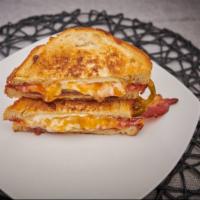 The Sandwich That Saved Mari’s Life · Yes really.  Thick cut bacon, pickled jalapenos, cream cheese, raspberry chipotle sauce, and...
