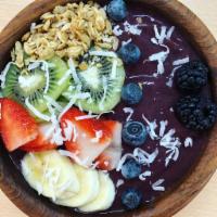 Acai Bowl · Served with strawberries, banalñna, kiwi, berries, granola and coconut flakes.