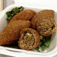 Kibbeh (3 pieces) · Ground beef & burghul (cracked wheat) dumplings stuffed with pine nuts, onions, ground beef ...