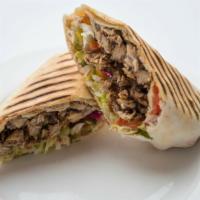 Shawarma  (Chicken Wrap) Halal · with your favorite spread and toppings  beef  lamb combo. 