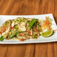 Chicken Fried Rice · Fresh chicken stir fried with vegetables combined with the chef’s special fried rice sauce.