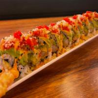 Spicy Dragon Roll · Inside: shrimp tempura, avocado, and cucumber top: spicy tuna, avocado, sesame seeds, and re...