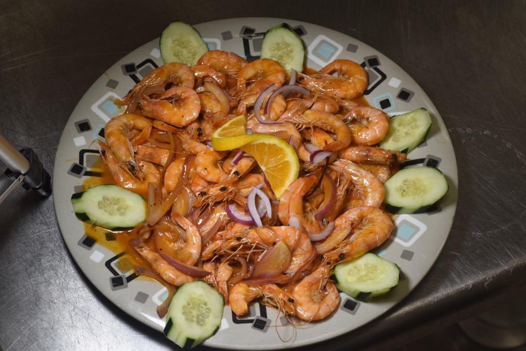 Camarones al Vapor · Steamed shrimp.