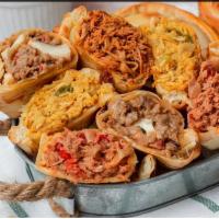 Empanadas by the dozen · Choose any flavor you love!