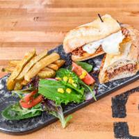 Slow Cooked Short Rib Sandwich · Slow cooked short rib topped with melted Gouda cheese served in a French baguette with your ...