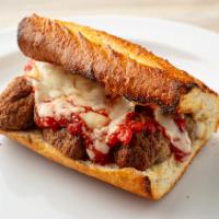 Baked Meatball Sandwich · Meatballs, mozzarella, housemade marinara on a fresh baguette.