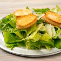 Caesar Salad · Romaine lettuce, housemade croutons, shaved Parmesan, Caesar dressing.