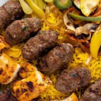 24. Combination Plate · Beef  Kabob, Kefta Kabob and Chicken Kabob , a choice of Rice or Green mix , served with Gri...
