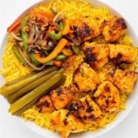 25. Chicken Kabob Plate · Tender pieces of chicken breast with mixed spices, garlic with a choice of Rice or Green mix...