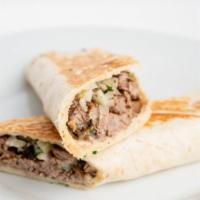 Beef Shawarma Wrap · Beef Shawarma with Onions , Parsley, Tahini sauce