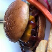 BBQ Bacon Burger · Topped with melted cheddar cheese, BBQ sauce, sauteed onions, and bacon. Served on a toasted...