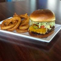 Cheeseburger · Topped with American cheese, lettuce, tomato, onion, and pickle. Served on a toasted brioche...