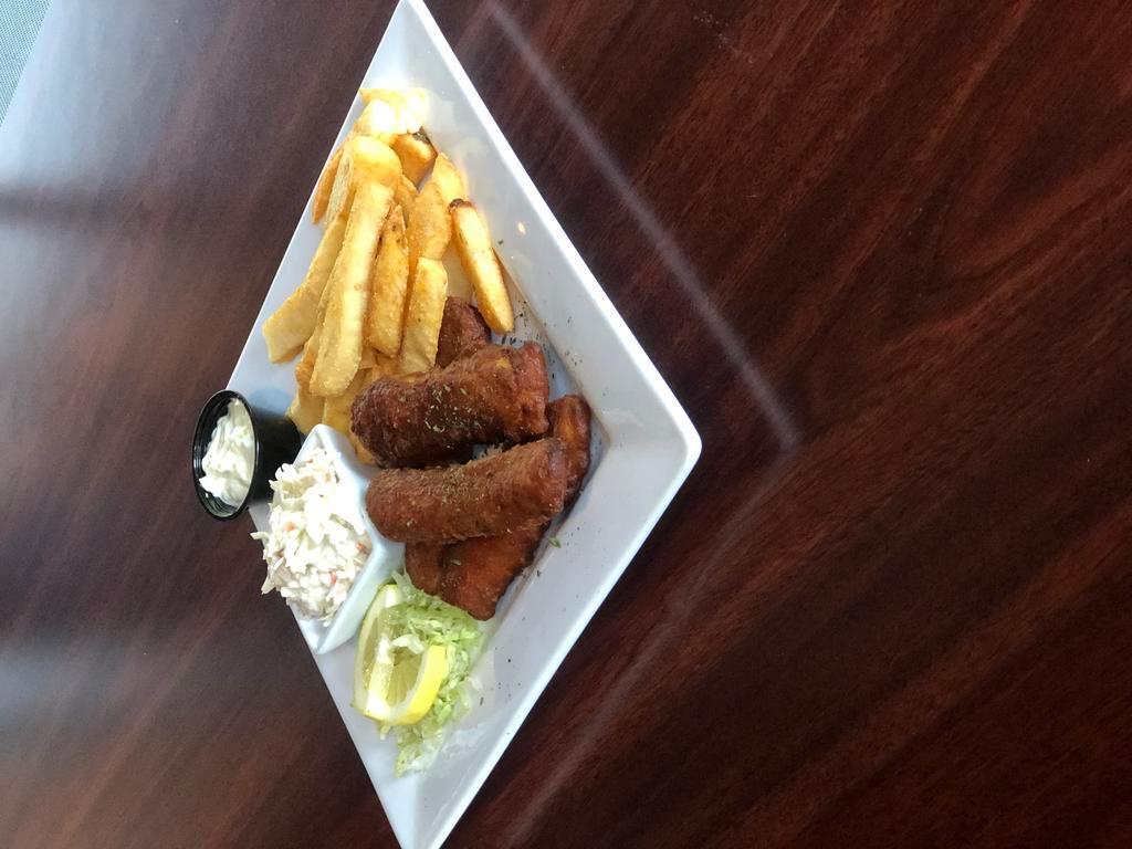 Guiness Fish · Delicious Guinness beer-battered cod fillets. Served with steak fries, coleslaw, and tartar sauce.