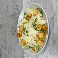 Large Caesar Salad · Crisp romaine lettuce, signature made-in-house Caesar dressing, croutons and shaved Parmesan...