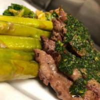 Flank Steak Chimichurri · Marinated and grille flank steak topped with our house-made chimichurri sauce, served with t...