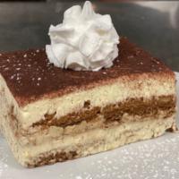 Tiramisu · Layers of espresso drenched sponge cake divided by marscarpone cream, dusted with cocoa powd...