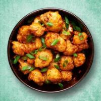 Firecracker Cauliflower  · A delicious crisp fried appetizer made with cauliflower flowerets, spices and herbs.
