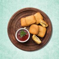 Cottage Cheese Fritters · Home made indian semi-soft cubes of cheese dipped in chickpeas batter and deep fried. 
