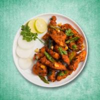 Firecracker Chicken  · A spicy and lip-smacking snack made with wok tossed chicken fritters smothered in spicy curr...