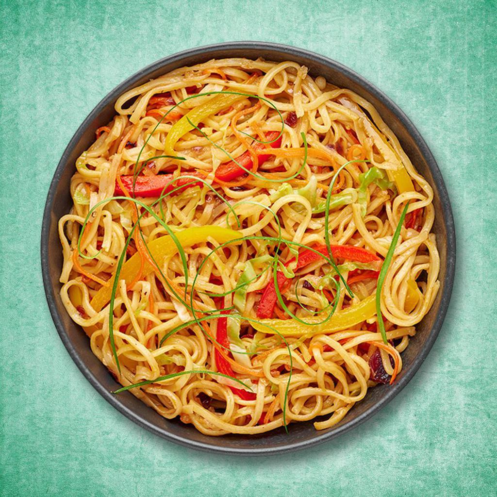 Wok Tossed Veg Noodles · Thin noodles are tossed with veggies and sauces on high flame to make this Indo Chinese delicacy.
