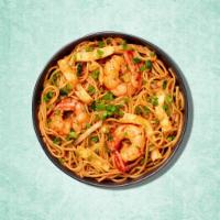 Wok Tossed Shrimp Noodles · Thin noodles are tossed with fried shrimp,  veggies and sauces on high flame to make this In...