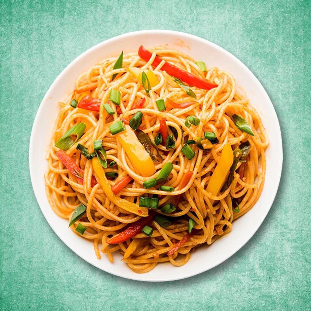 Fiery Vegetarian Noodles · A popular Indo Chinese dish that features stir fried vegetables and noodles tossed with a homemade Indo Chinese sauce that’s got a kick of heat and just the right hint of sweetness.

